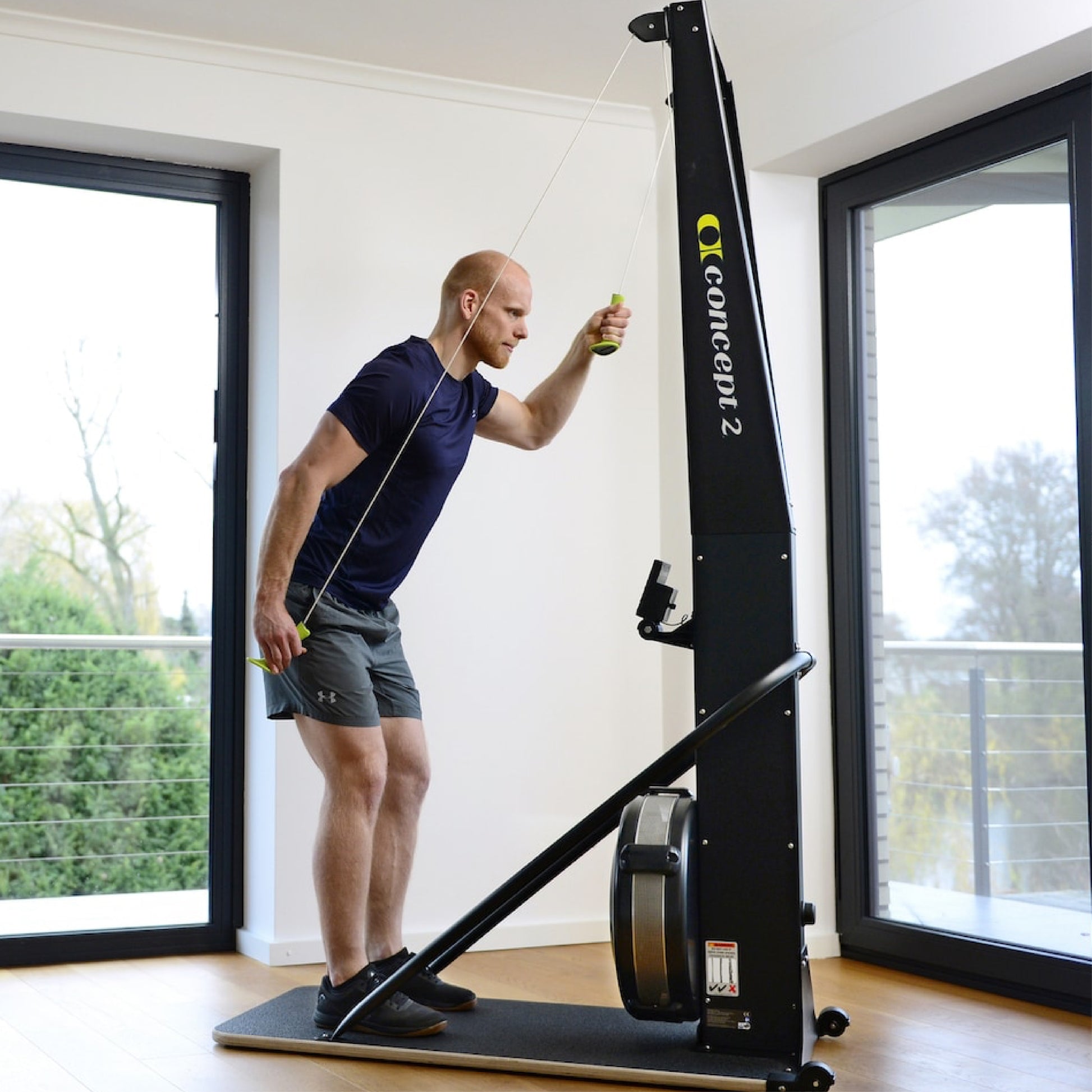 Man working out with Concept2 SkiErg Ski Machine